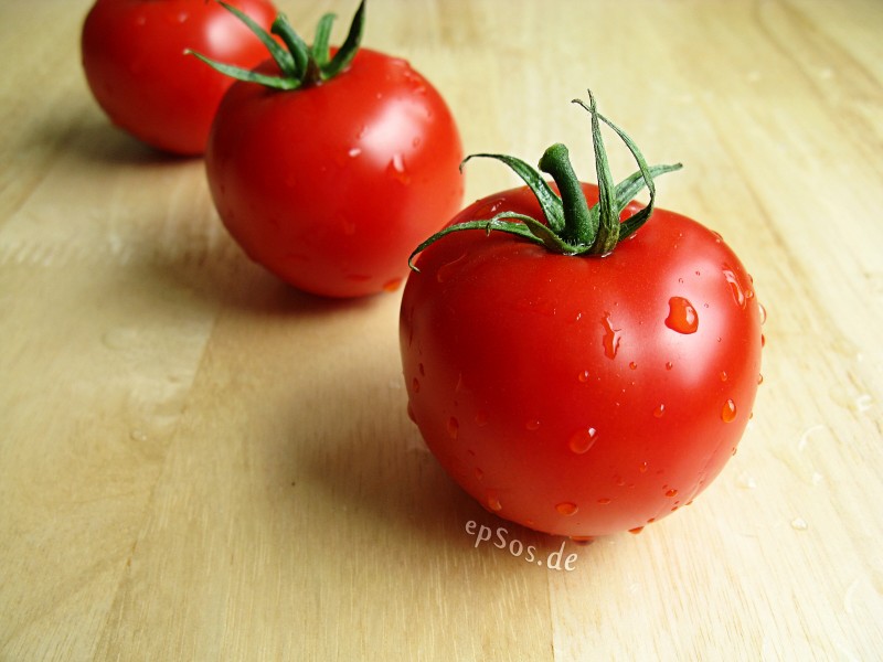 Healthy Red Tomatoes with Water Drops